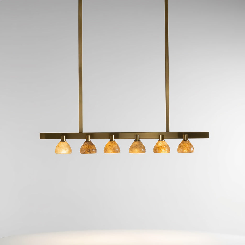 Original photograph of six alabaster shades on a brass linear pendant with two suspension rods